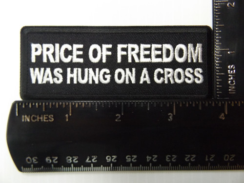 Product photo of Price of Freedom was hung on a Cross available at Forever And Always Online, Farmerville, Louisiana.