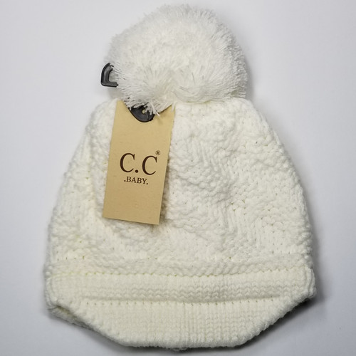 Product photo of the BABY C.C BEANIE w/BRIM BEIGE baby beanie hat, showing the soft knit fabric, color, and pom pom detail, available at Forever And Always Online.