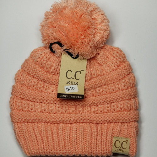 Product photo of the KIDS POM POM BEANIE  PEACH baby beanie hat, showing the soft knit fabric, color, and pom pom detail, available at Forever And Always Online.