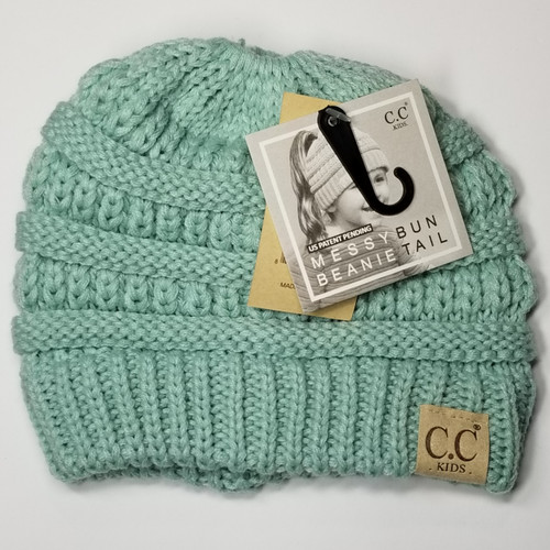 Product photo of the KIDS C.C MESSY BUN BEANIE MINT baby beanie hat, showing the soft knit fabric, color, and pom pom detail, available at Forever And Always Online.