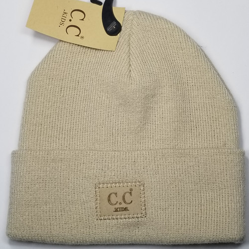 Product photo of the KIDS C.C BEANIE BGE baby beanie hat, showing the soft knit fabric, color, and pom pom detail, available at Forever And Always Online.