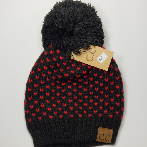 Product photo of the C.C BEANIE BLK/RED HEART baby beanie hat, showing the soft knit fabric, color, and pom pom detail, available at Forever And Always Online.