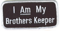 Flat-lay product photo of the I Am My Brothers Keeper Patch Black with White Writing embroidered iron-on biker patch, showing full color detail, lettering, and stitching, sold at Forever And Always Online.