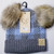 Product photo of the BABY C.C BEANIE BLACK/PALE BLUE baby beanie hat, showing the soft knit fabric, color, and pom pom detail, available at Forever And Always Online.