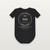 Pontoon Captain Lake D'Arbonne Baby Bodysuit with Psalm 107:29 (Lake Badge) - Black