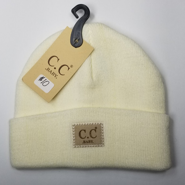 Product photo of the BABY C.C BEANIE BEIGE baby beanie hat, showing the soft knit fabric, color, and pom pom detail, available at Forever And Always Online.