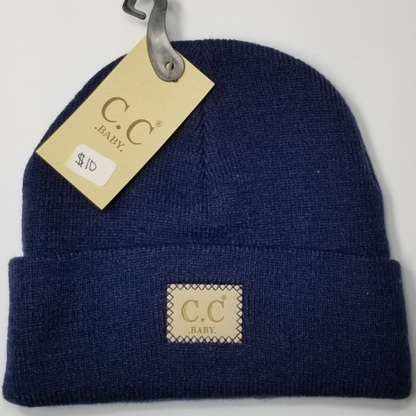 Product photo of the BABY C.C BEANIE NVY baby beanie hat, showing the soft knit fabric, color, and pom pom detail, available at Forever And Always Online.