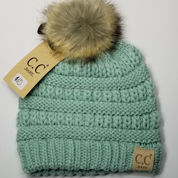 Product photo of the BABY C.C BEANIE POM POM MINT baby beanie hat, showing the soft knit fabric, color, and pom pom detail, available at Forever And Always Online.