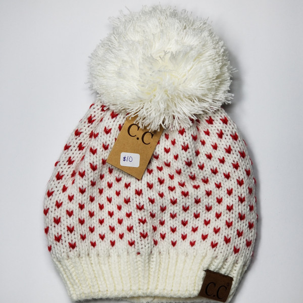 Product photo of the C.C BEANIE WHT/RED HEART baby beanie hat, showing the soft knit fabric, color, and pom pom detail, available at Forever And Always Online.