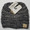 Product photo of the KIDS C.C MESSY BUN BEANIE G/BLK/WHT baby beanie hat, showing the soft knit fabric, color, and pom pom detail, available at Forever And Always Online.
