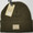 Product photo of the KIDS C.C BEANIE NEW OLIVE baby beanie hat, showing the soft knit fabric, color, and pom pom detail, available at Forever And Always Online.