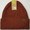 Product photo of the C.C BEANIE  BRNT HENNA baby beanie hat, showing the soft knit fabric, color, and pom pom detail, available at Forever And Always Online.