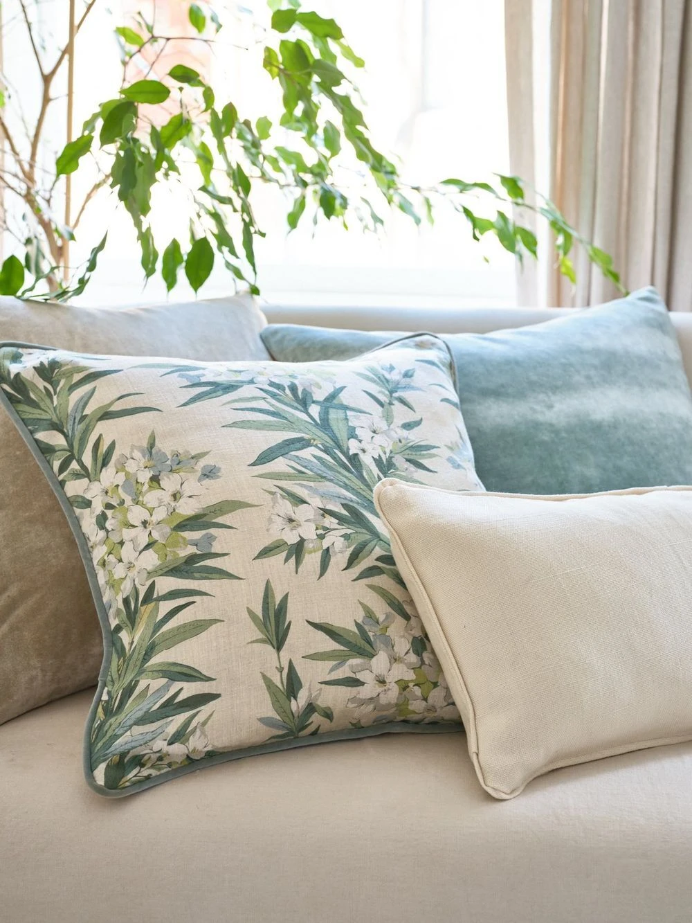 Decorative pillows on a linen sofa