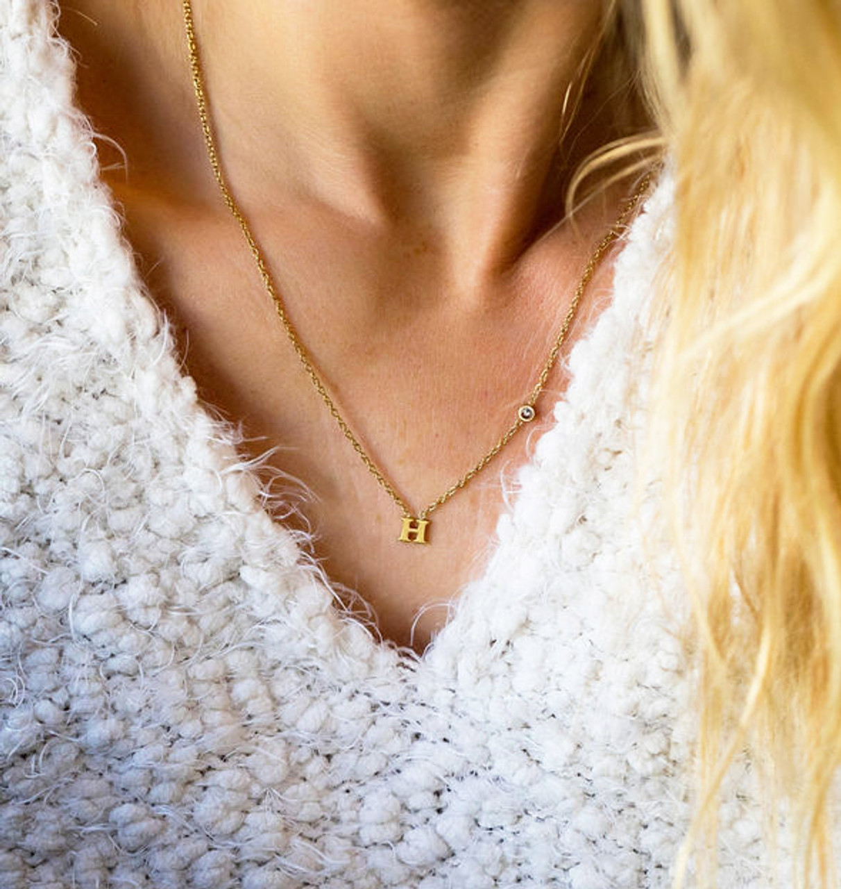 Floating initial store necklace