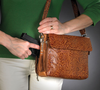 Beautiful tooled cowhide is super stylish as concealed carry purse for women