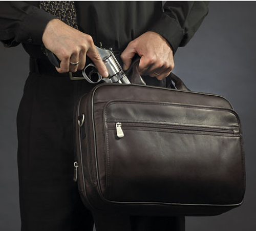 Immediate and easy access to concealed carry weapon from this working handbag