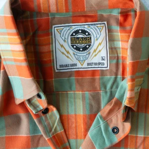 New for Fall 2026! Men's Black Dragon Orange & Teal Tartan Flannel Shirt