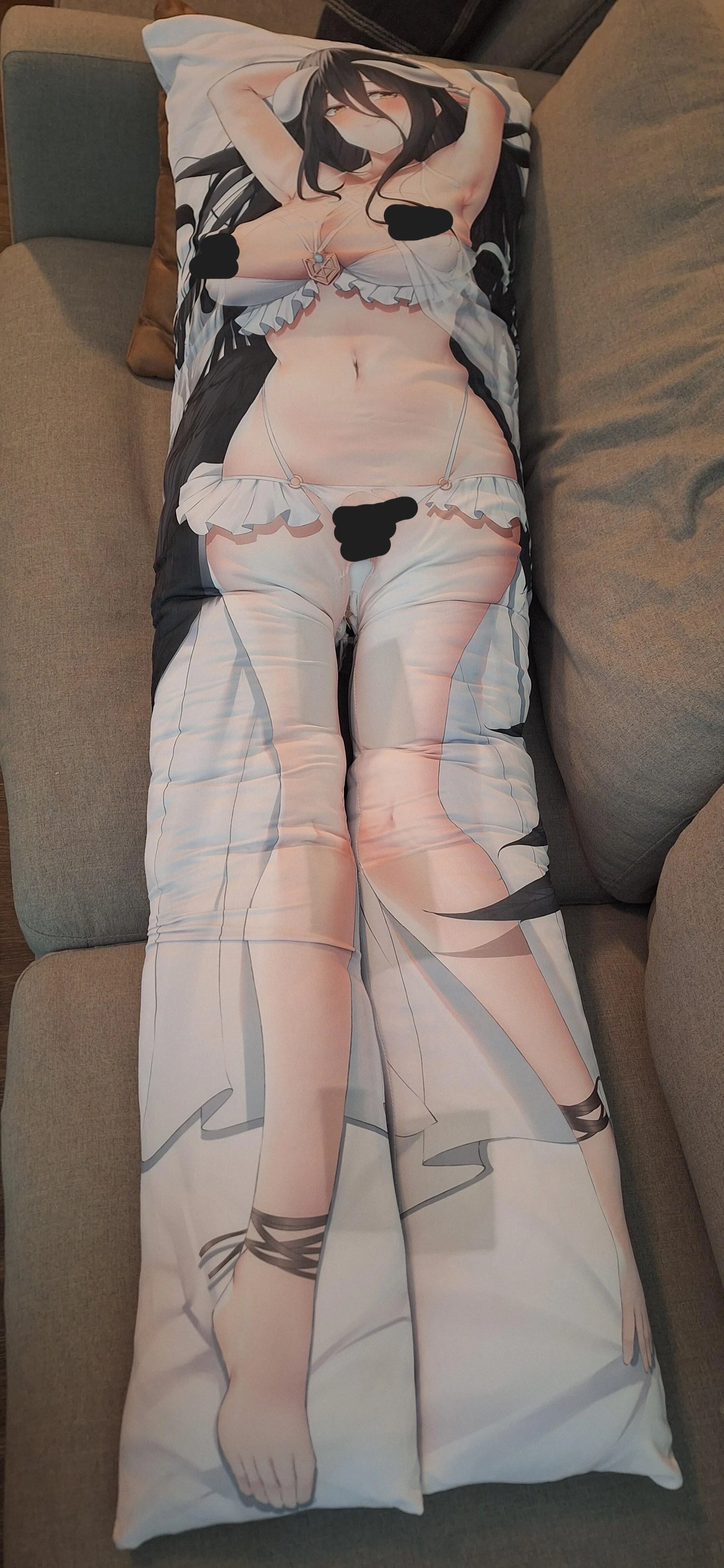 2-Legs dakimakura lying on a couch