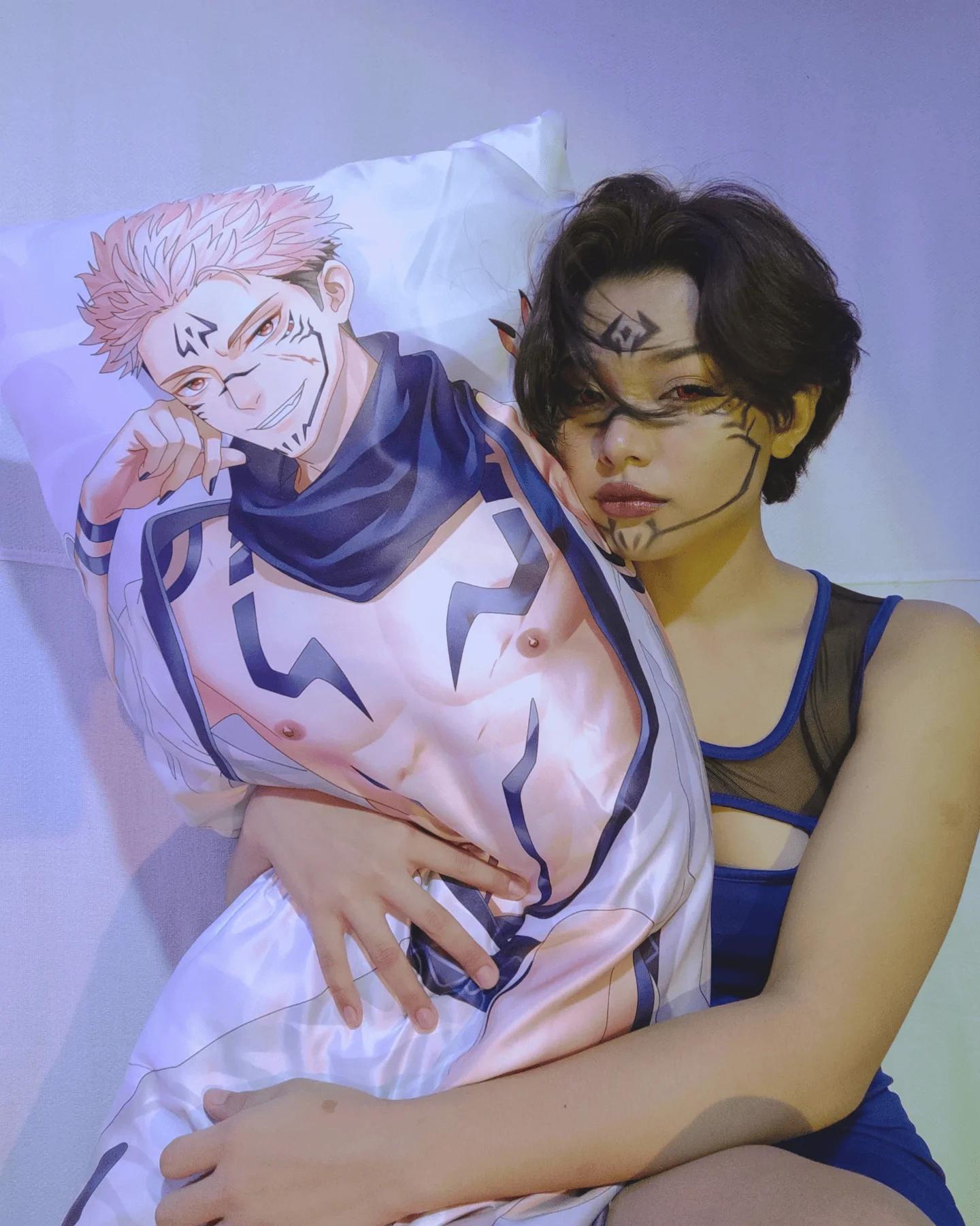 Person hugging an anime body pillow
