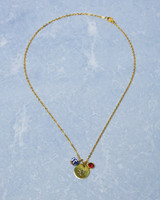 Goudkleurige zodiak ketting met een symbool van het sterrenbeeld Steenbok, van Heinen Delfts Blauw