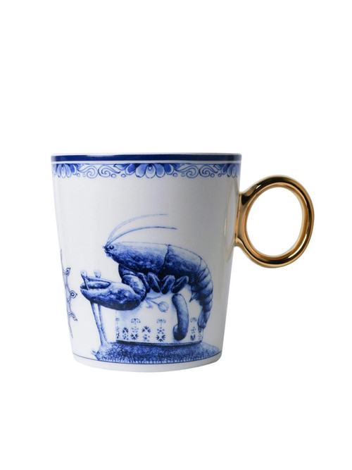 Een Delfts blauwe mok met het sterrenbeeld kreeft erop.