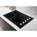 Whirlpool® 30-inch Electric Ceramic Glass Cooktop with Two Dual Radiant Elements WCE77US0HS