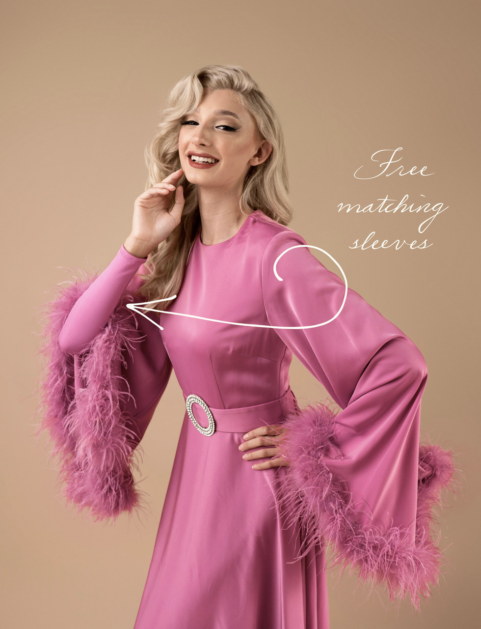 pink satin dress with feathers The pink satin dress adorned with feathers from the Fall 2023 Couture Collection symphonic fusion of timeless elegance. #BesianaZoguCouture #Fall2023
