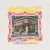 Up close photograph of the screen printed design on front of a vintage photograph of a bodega by Justo A. Martí with custom illustrations by Alyssa Monet