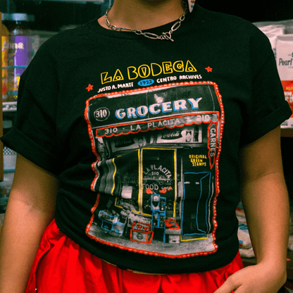 Photo of a woman wearing the La Placita Bodega 100% Black T-shirt