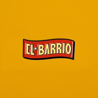 Soft enamel pin of an emblem saying "El Barrio," a historic Puerto Rican neighborhood located in East Harlem