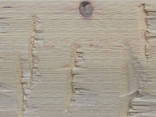 Closeup of Heavy Hand Hewn Natural Wood Beam