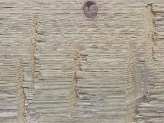 Closeup of Heavy Hand Hewn Natural Wood Beam