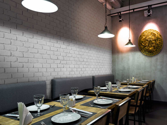 Rustic Brick in Dove White faux wall panels used to decorate this restaurant.