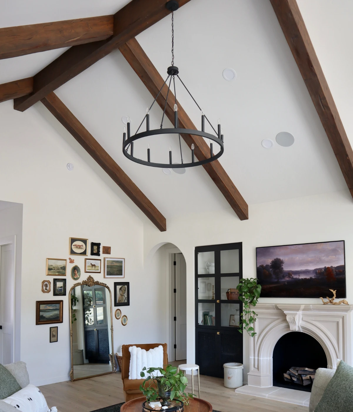 faux wood beams in arched living room design