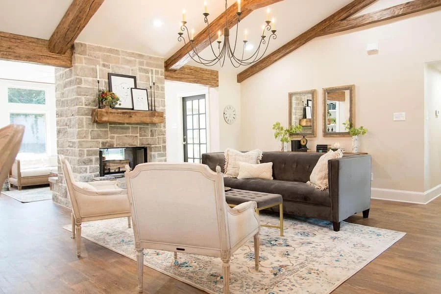 Faux wood beams and mantels in a living room