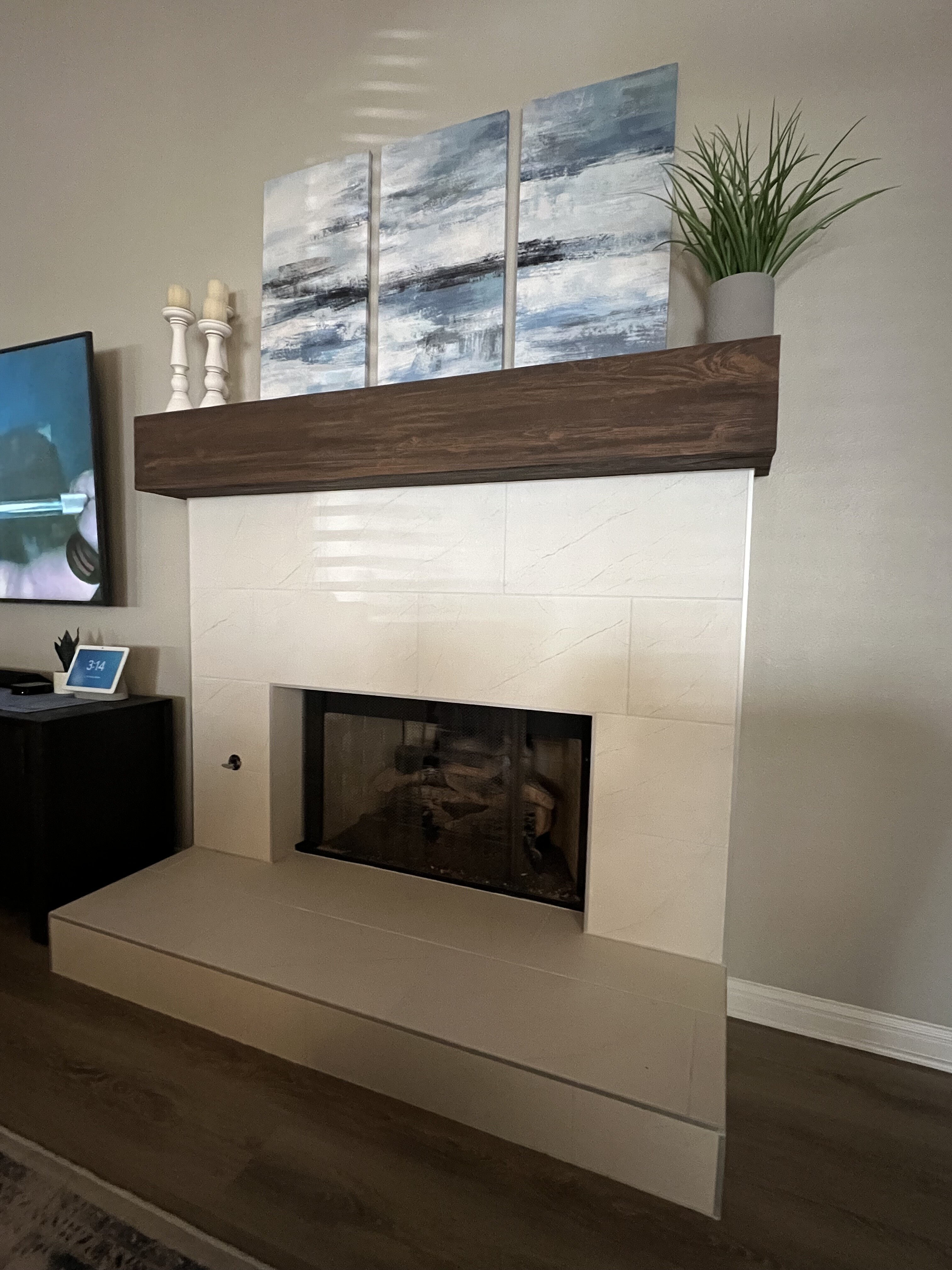 Fireplace featuring Old Barn Faux Wood Mantel in Burnished.