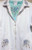 Embellishing Ideas: A pair of "Colorful Floral Decor" designs, embellishing pockets of SW1003 White (sold separately).
