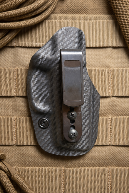 STS Concealment tuckable IWB Kydex holster for SCCY DVG-1 pistol with adjustable retention and concealment claw
