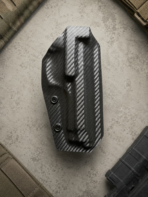STS Concealment OWB Kydex Paddle Holster for Beretta 92FS with durable carbon fiber finish and precision-molded retention for dependable everyday carry.