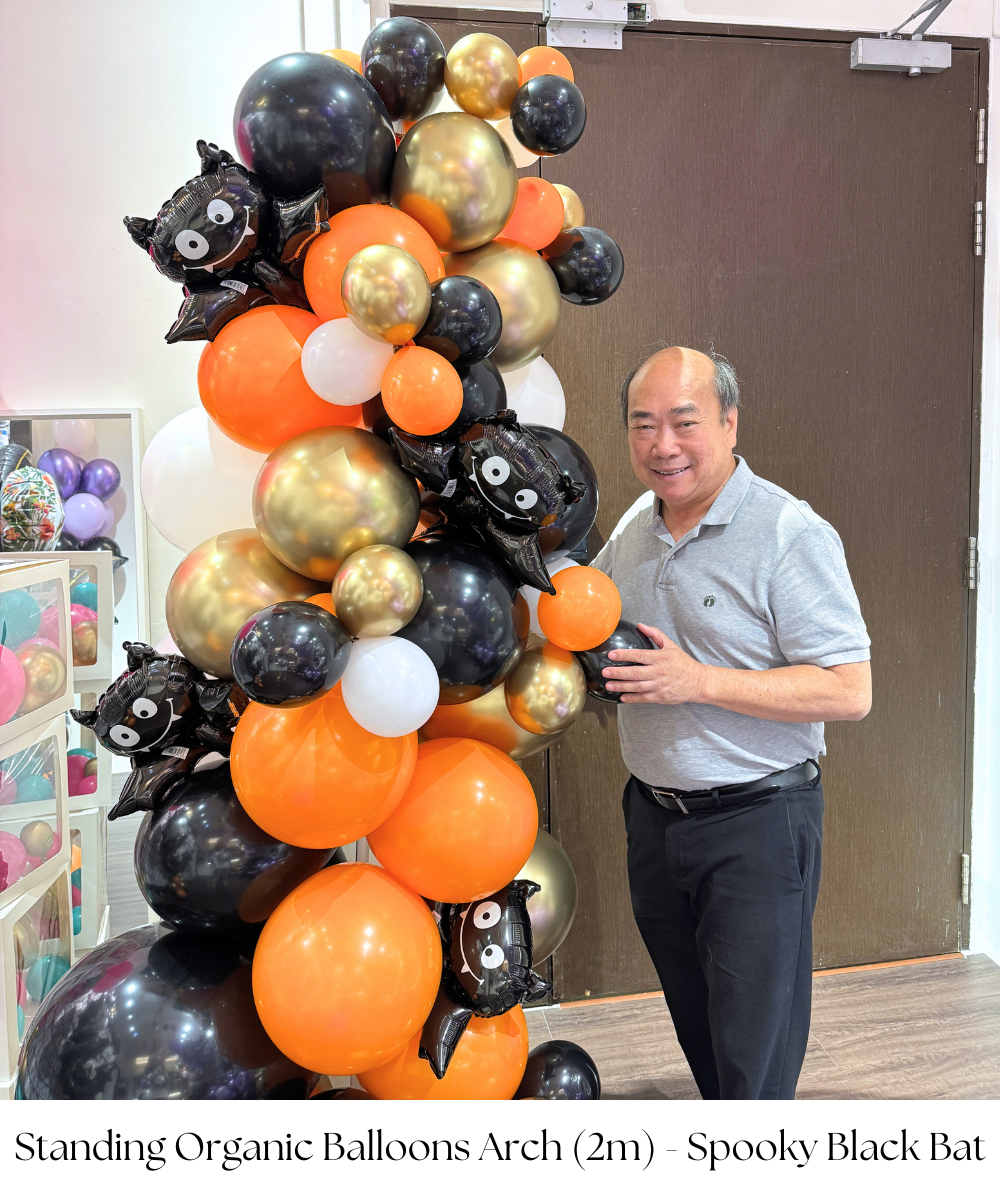 Create a hauntingly beautiful atmosphere with our [Frightfully Fun Halloween] Standing Organic Balloons Arch (2m) - Spooky Black Bat! This eerie arch stands at an impressive 2 meters tall, featuring an organic arrangement of black and orange balloons with spooky bat accents that are perfect for setting the Halloween mood. Ideal as a striking entrance piece or a dramatic backdrop for your event, this full arch adds a bold, festive touch to your spooky celebration. It's the ultimate decoration for Halloween parties, haunted houses, or any chilling occasion!