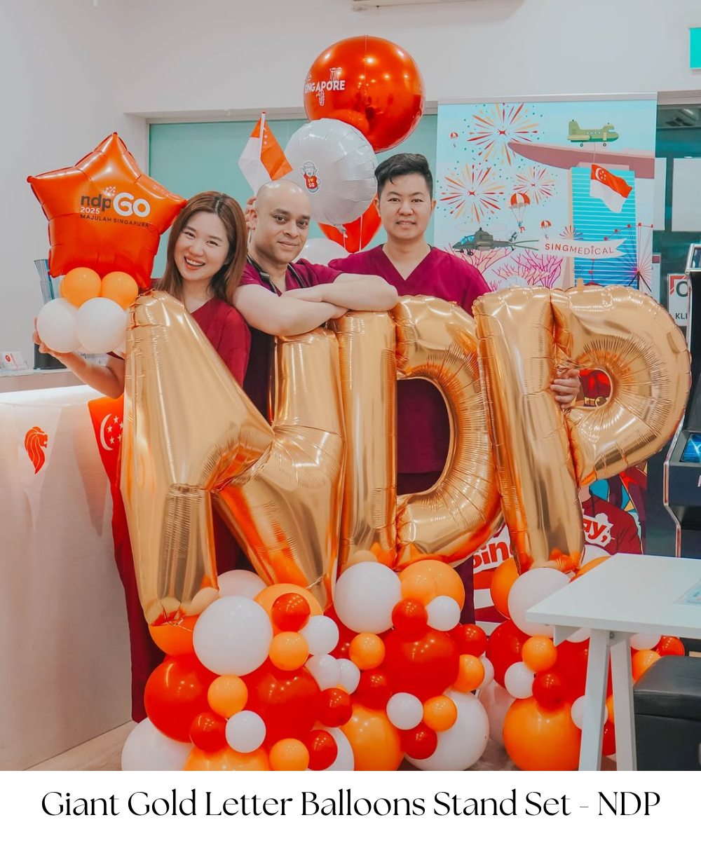 Celebrate National Day 2025 with our NDP Fashion Balloon Stand. Featuring "N", "D", and "P" balloons in stunning Gold, this stand is complemented by a vibrant base of red, orange, and white balloons. Perfect for adding a touch of sophistication and festivity to your event, this stylish balloon stand is ideal for parades, public gatherings, or private parties. Its eye-catching design and bold colors will create a memorable atmosphere, making your National Day 2025 celebration truly special.