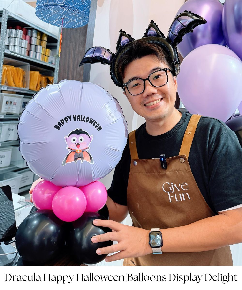 Add a touch of spooky charm to your table with our Halloween Balloon Table Delight! Featuring an 18" personalized foil balloon with a Dracula graphic and a stylish black & fuchsia balloon base, this 52cm tall centerpiece is perfect for displaying on your Halloween table for trick-or-treat fun. Air-inflated for long-lasting enjoyment, it’s ideal for creating a festive atmosphere all night long. This charming balloon display is designed to captivate, serving as an ideal table centerpiece that adds a touch of romance and whimsy to any occasion. 