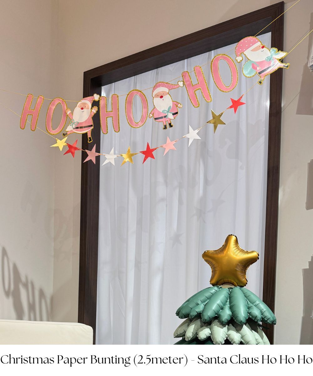 Get into the holiday spirit as the Christmas approaches by decorating your house with this Christmas Paper Garland-Santa Claus Ho Ho Ho! This time, we go out of the red and green Christmas norm! One packet comes with 2 garland in it. One of it features 3 different Santas dressed in Pink along with the word 'HOHOHO' cut-outs. The other features a star paper garland with alternating Gold,Red,Pink and White colors. Suitable to hang on a wall/window, along a table or as a backdrop for photo taking!