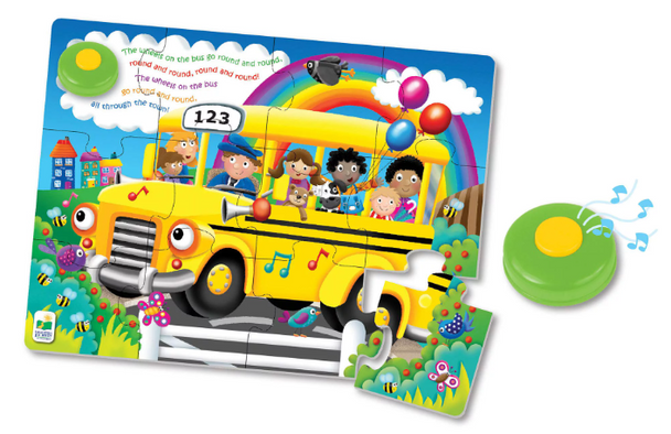 Wheels on the Bus Switch adapted large puzzle pieces with singing button.
