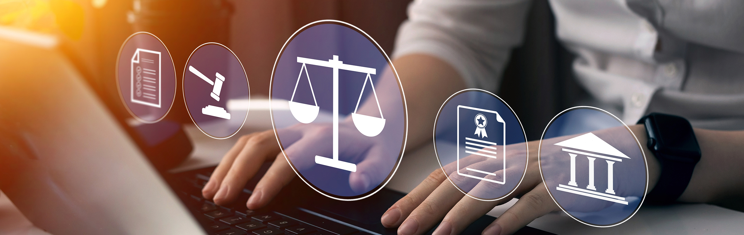 Close up of hands at a computer keyboard and icons of a list, gavel, scale,  document, courthouse