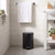 Black pedal bin in bathroom, shown beside sink and towel rail