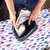 Beldray beige steam iron soleplate, shown upright for product listing.