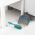 Grey and blue silicone dustpan and brush set shown on a white background