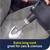 Handheld steam cleaner cleaning soapy window, shown streak-free for reflective surfaces