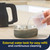 Steam cleaner LED display shows temperature and steam mode with power button pressed